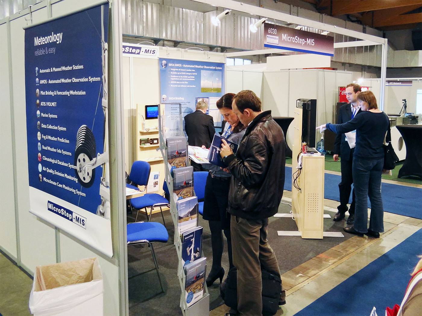 Visitors in MicroStep-MIS' stand during the expo hours